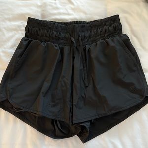 NEVER WORN. Albion fit high waisted shorts. Black. Medium.